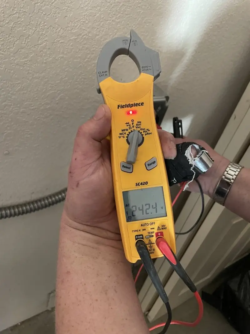 Voltage testing with clamp meter during Generator Installation in Eudora